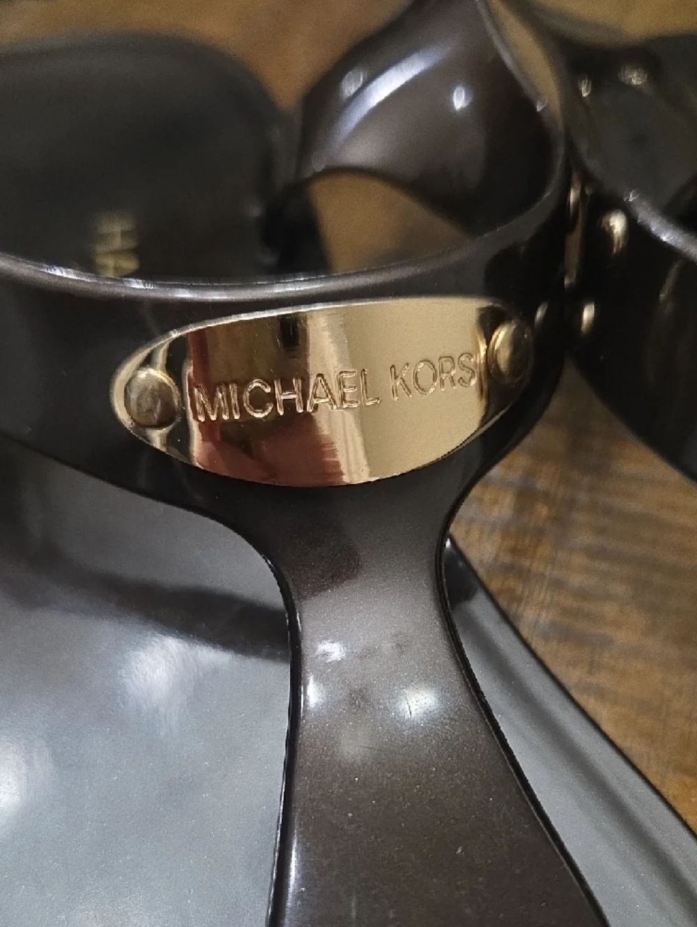 Michael Kors Black Jelly Thong Sandals with Gold Accents